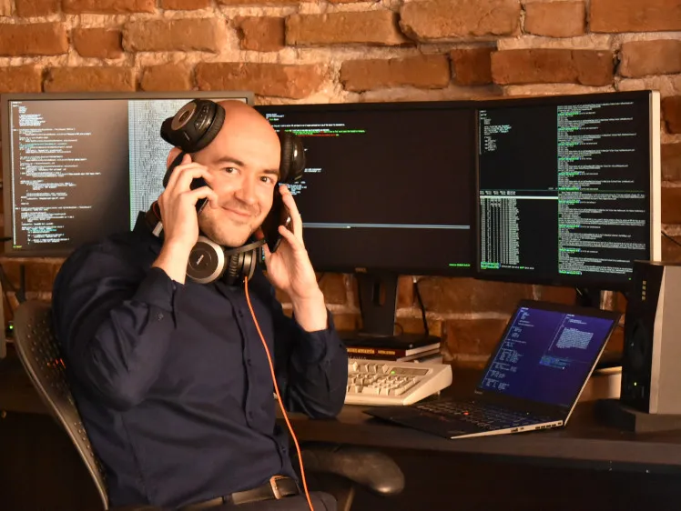 Michal Mazurek at his desk